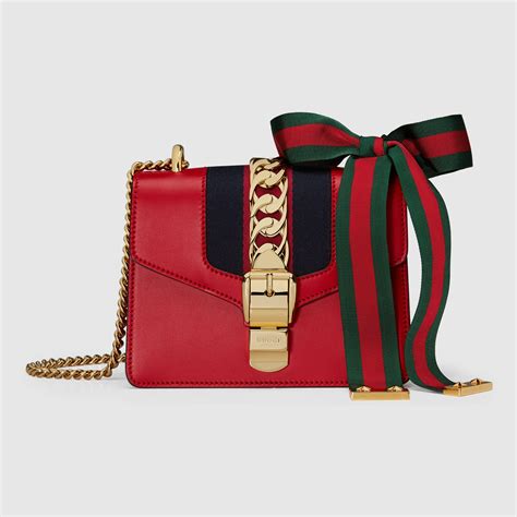 gucci mini sylvie chain shoulder bag|Sylvie 1969 small shoulder bag in brown leather .